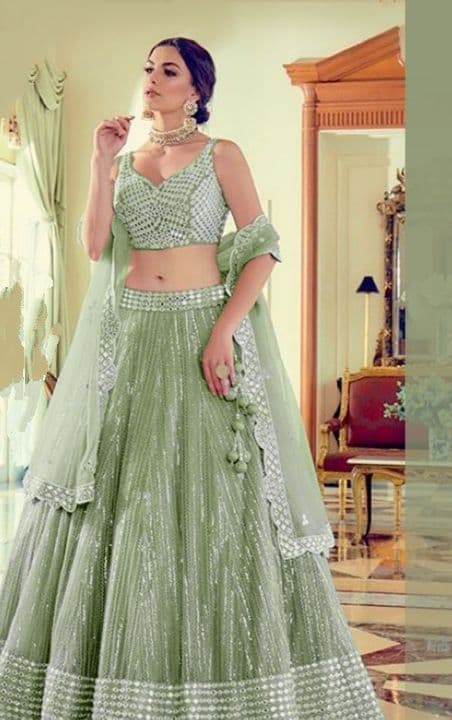 Enamoring Green Color Net Silk Embroidered Work Lehenga For