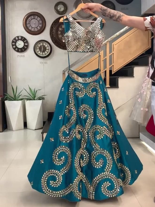 Capricious Firozi Color Taffeta Silk Embroidered Work Lehenga Choli