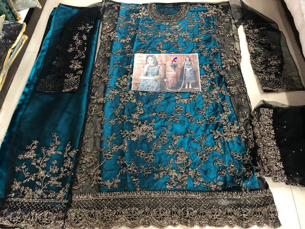 Preferable Firozi Color Net Design Embroidered Work Salwar Suit For Ladies