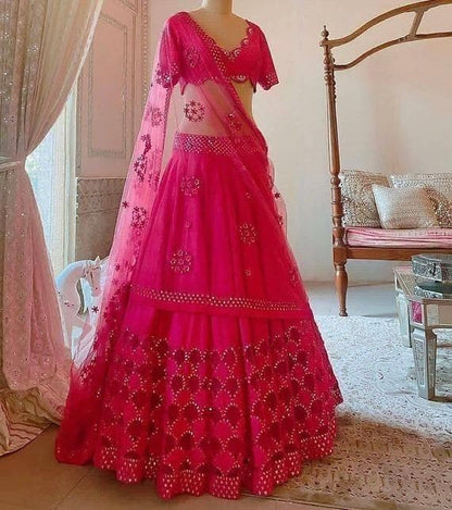 Preferable Rani Pink Color Net Sequence Embroidered Work Design Lehenga Choli