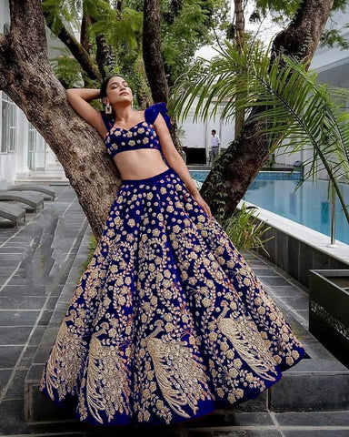 Entrancing Royal Blue Color Bridal Wear Velvet Embroidered Work Lehenga Choli