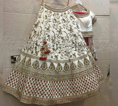 Magnetic Off White Color Art Silk Embroidered Work Occasion Wear Lehenga Choli