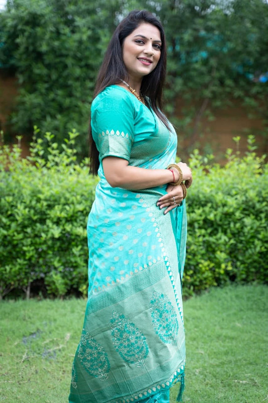 Dismaying Firozi Color Art Silk Casual Wear Zari Weaving Saree Blouse