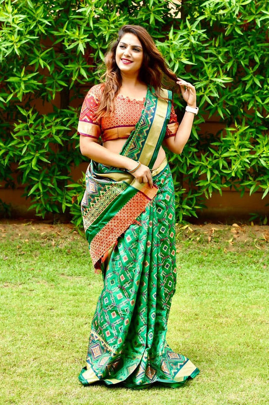 Opulent Green Color Patola Silk Jacquard Weaving Saree Blouse