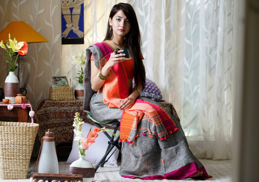Attractive Grey Orange Premium Linen Designer Saree For Women