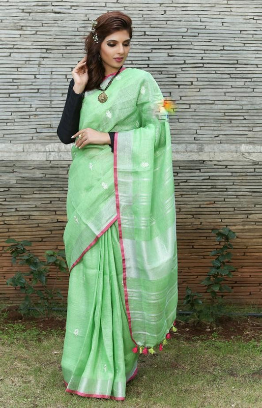 Intricate Light Green Colored Festive Wear Linen Saree For Women
