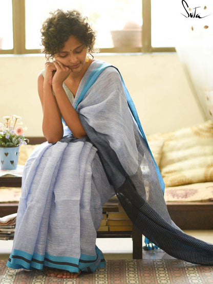 Preferable Sky Blue And Grey Colored Festive Wear Pure Linen Designer Saree For Women