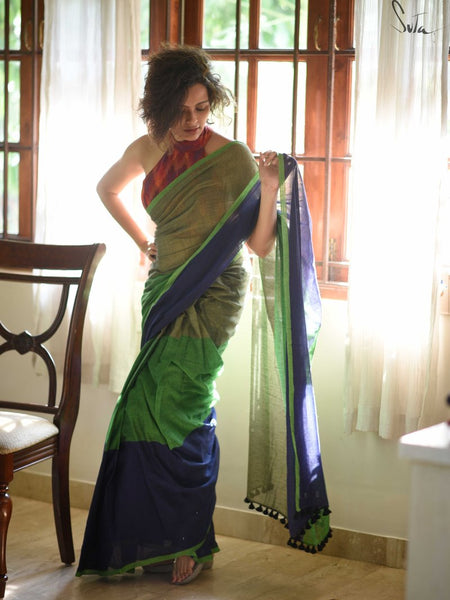 Surpassing Navy Blue And Green Colored Festive Wear Pure Linen Beautiful Designer Saree For Women