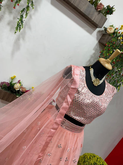 Peach Color Party Wear Designer Net Lehenga Choli With Dupatta