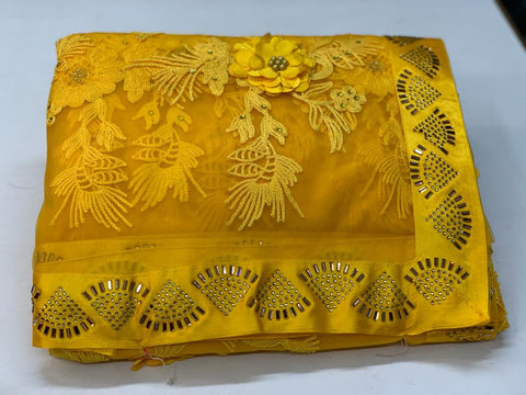 Corn Color Party Wear Soft Net Fancy Rubin Work Flower With Hot Fix Diamond Border Saree Blouse