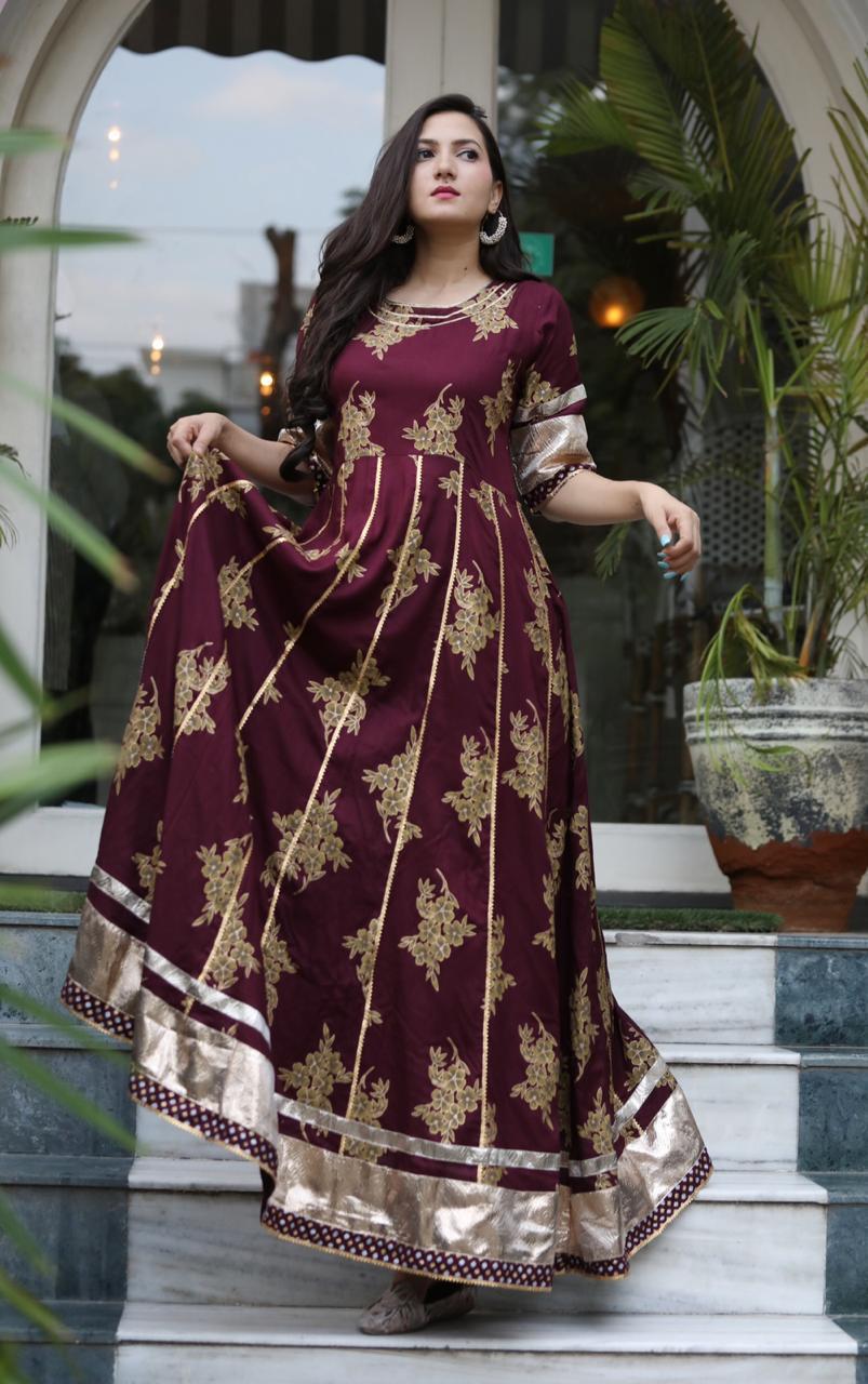 Wine Color Golden Printed With Gotta Patti Lace Back Side Dori Gown For Festive Wear